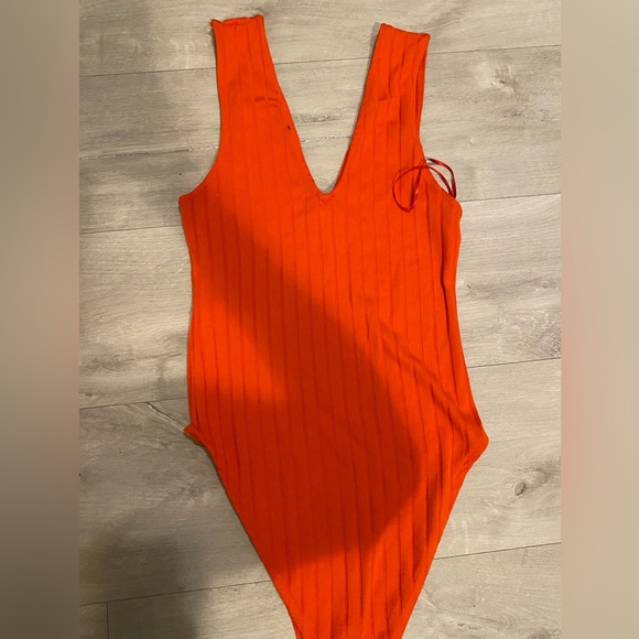 Zara body suit - vibrant orange with buttons at the bottom - Picture 2 of 4